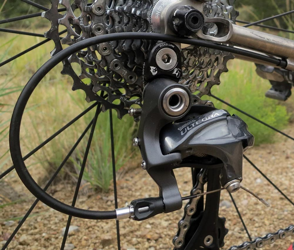 Wolf Tooth RoadLink Schaltwerk-Adapter - Shimano / Sram 10-11-fach 11-40 Zaehne 7 Wolf Tooth RoadLink Schaltwerk-Adapter - Shimano / Sram 10-11-fach 11-40 Zaehne – Bild 5